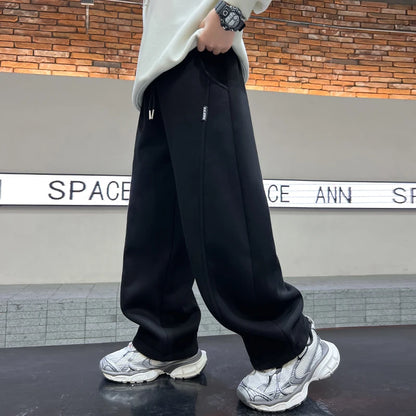 Printemps automne enfants couleur unie bref Style pantalons de sport pour Tween garçon pantalon sportif décontracté enfants coton pantalons de survêtement âge 5-14